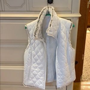White fur vest